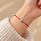 Red String Wristband With Silver Lucky flower