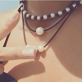 Choker en cuir avec perles d'eau douce fait main - Charms Danse de Lune
