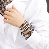 Wickelarmband aus Perlmuttleder – Mondtanz-Charms