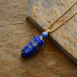 Meilleur collier pendule et bouteille de parfum