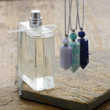 Meilleur collier pendule et bouteille de parfum