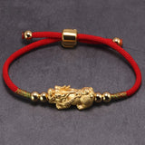 Bixie Rode String Armband - Moon Dance Charms