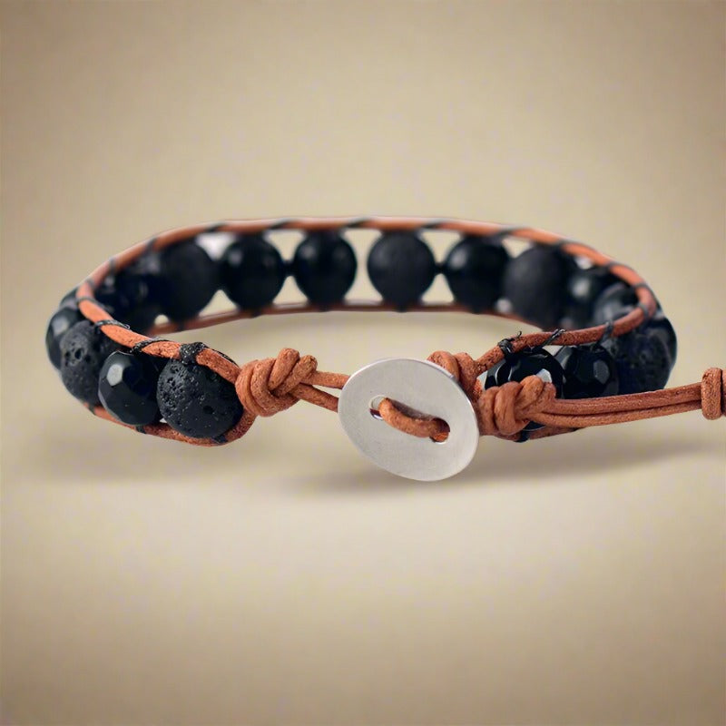 Krachtige diffuserarmband met lavasteen en onyx kralen